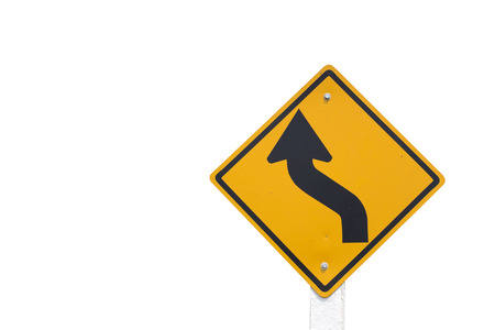 Curved Road Traffic Sign isolated on white backgroundの写真素材
