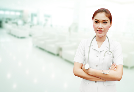 nurse with stethoscope in hospital backgroundの写真素材