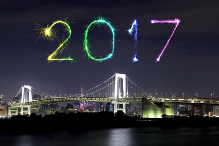 2017 New Year Fireworks celebrating over Tokyo Rainbow Bridge at Night, Odaiba, Japan
