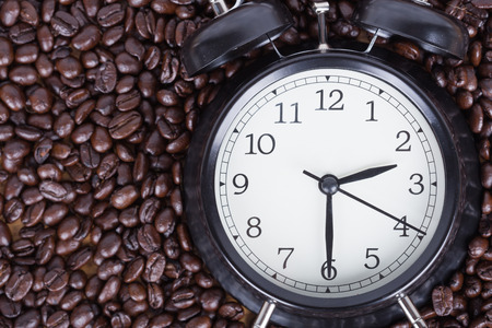 vintage clock and coffee beans (Coffee time concept)の写真素材