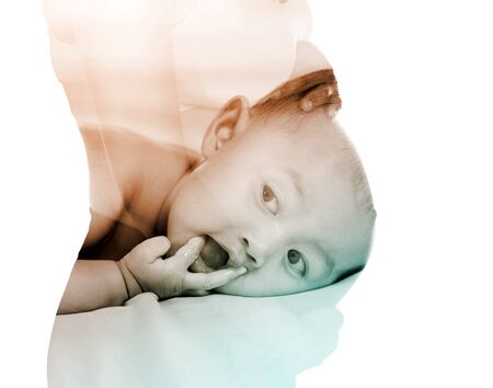 Double exposure of baby with belly of pregmant woman isolated on white backgroundの写真素材