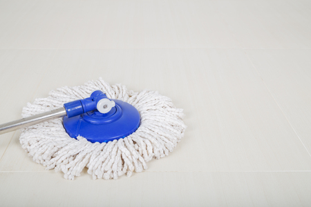mop for cleaning with the floor backgroundの写真素材