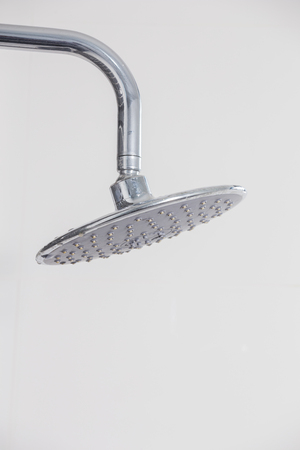 rain shower head in the bathroomの写真素材