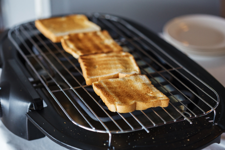 Toast bread on toaster in hotel