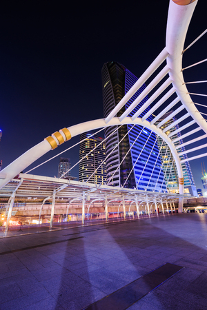 public sky walk at Chong Nonsi sky train station at night, Bangkok, Thailandの写真素材
