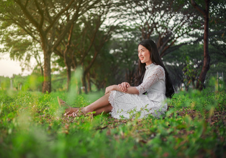 portrait of beautiful woman in the parkの写真素材