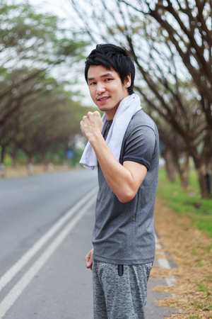 portrait of sporty man in the parkの写真素材