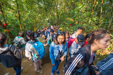 Chanthaburi Thailand-MARCH 10, 2018: unidentified people traveling to worship the footprint of Buddha at Khitchakut Mountain in Chanthaburi, Thailandのeditorial素材
