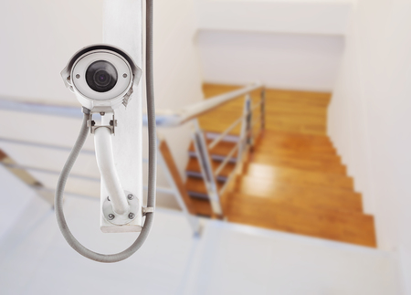 CCTV Camera or surveillance operating with stairs in houseの写真素材