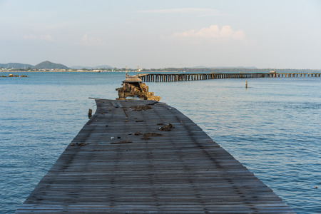 broken wooden bridge to the sea (damage from storm) at Rayong,Thailandの写真素材