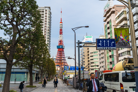 TOKYO, JAPAN - March 25, 2019: Unidendified people walk across the street in Tokyo city, Japanのeditorial素材