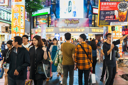 Taipei, Taiwan- 11 June, 2019: Crowd of people walking and shopping at Ximending street market at night in Taipei, Taiwan. Ximending is the famous fashion, night Market and street food in Taipei.のeditorial素材