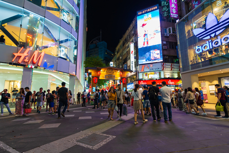 Taipei, Taiwan- 8 June, 2019: Crowd of people walking and shopping at Ximending street market at night in Taipei, Taiwan. Ximending is the famous fashion, night Market and street food in Taipei.のeditorial素材