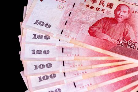 100 New Taiwan Dollar banknote, Cash isolated on a balck backbround