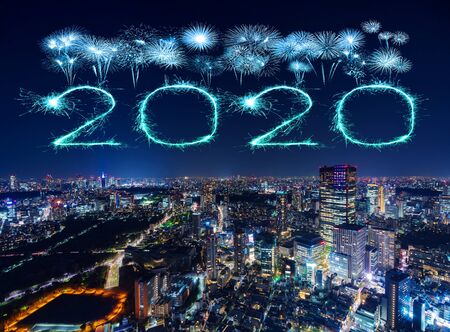 2020 Happy New Year fireworks celebrating over Tokyo cityscape at night, Japanの写真素材
