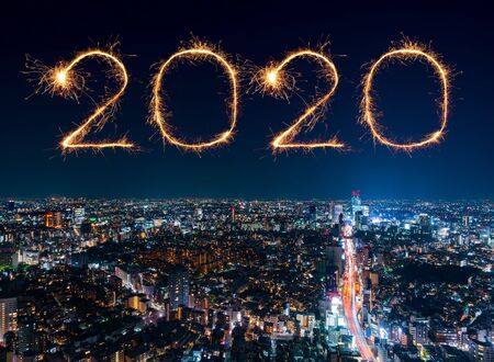 2020 Happy New Year fireworks celebrating over Tokyo cityscape at night, Japanの写真素材