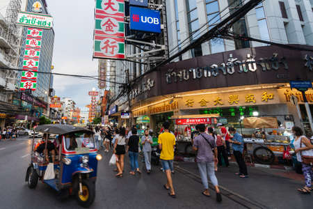 BANGKOK, THAILAND - AUG 9, 2020 : Crowded of people at Yaowarat road after COVID-19 virus pandemic. people must be wearing medical mask in Bangkok's Chinatown.のeditorial素材