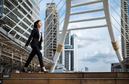 business woman walking in the cityの写真素材