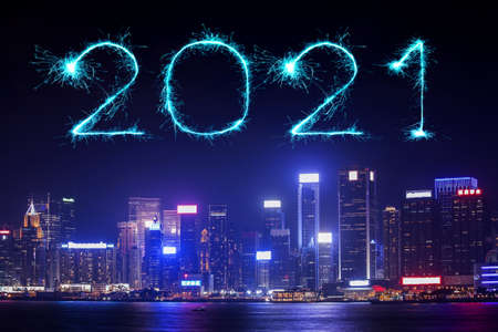 2021 Happy New Year fireworks celebrating over Hong Kong cityscape at night