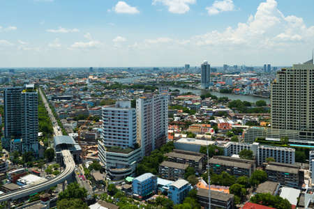 view of building with Chao Phraya River in Bangkok city, Thailand