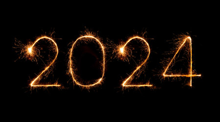 2024 happy new year fireworks celebration written sparkling at the nightの写真素材