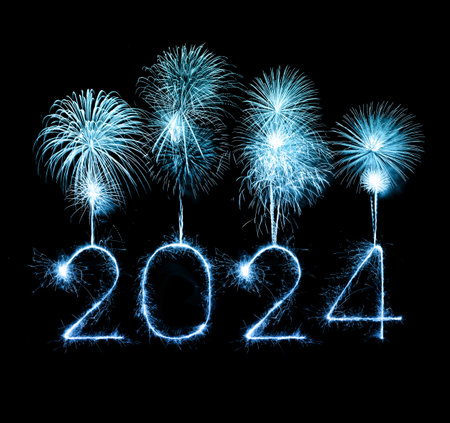 2024 happy new year fireworks celebration written sparkling at the nightの写真素材