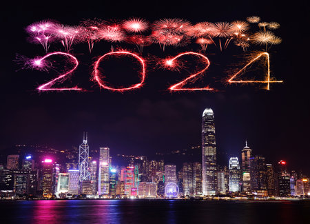 2024 Happy New Year fireworks over Hong Kong cityscape at the night.の写真素材