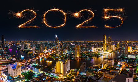 2025 happy new year fireworks celebrating over Chao Phraya river in Bangkok city at night, Thailandの写真素材