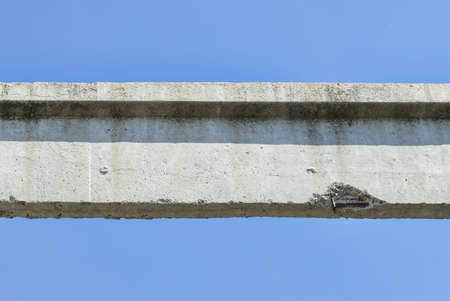 Concrete beam close up on blue skyの写真素材