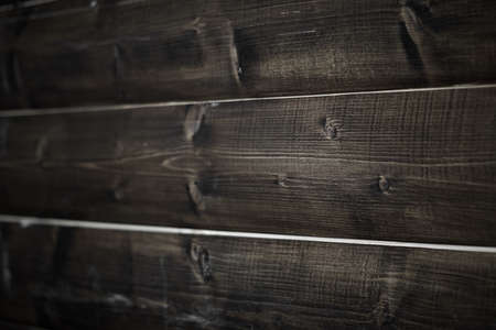Wall of dark wood timberの写真素材