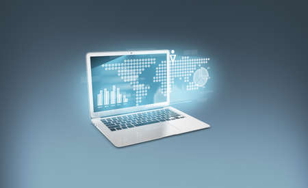 Business concept. Laptop with charts and graphsの写真素材