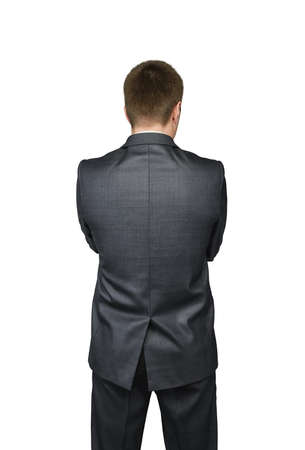 Businessmans back in a suit isolated on white background . Financial concept.の写真素材