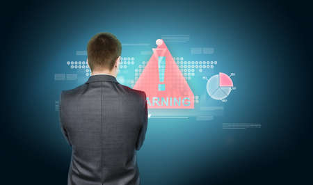 Business concept. Businessman in a suit on background with media and financial iconsの写真素材
