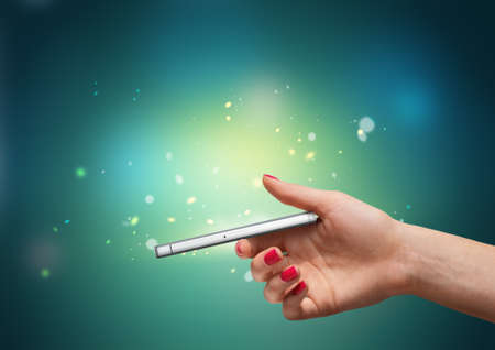 Smartphone in hand. Communication and technologyの写真素材