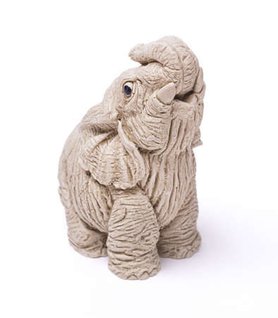Small statue of elephant on white backgroundの写真素材