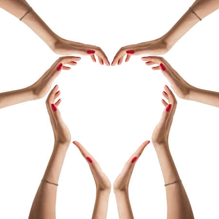 Sign of heart from hands folded isolated on white background. Family and love conceptの写真素材