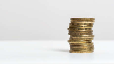 Pile of coins with open space center and left side, isolated on white background. Russian roubleの写真素材