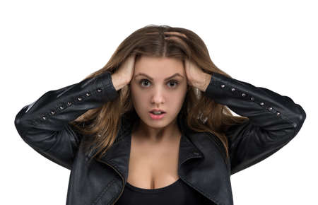 Glamorous hot young woman in leather jacket, isolated on white background.の写真素材