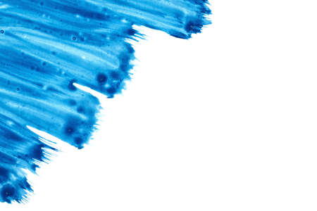 Blue gouache paint brush watercolor textures on white background.の写真素材