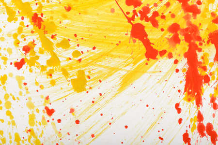 Yellow-red abstract hand-painted gouache brush stroke daub background textureの写真素材