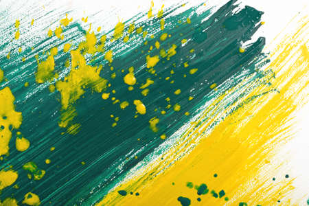 Yellow-green abstract hand-painted gouache brush stroke daub background textureの写真素材