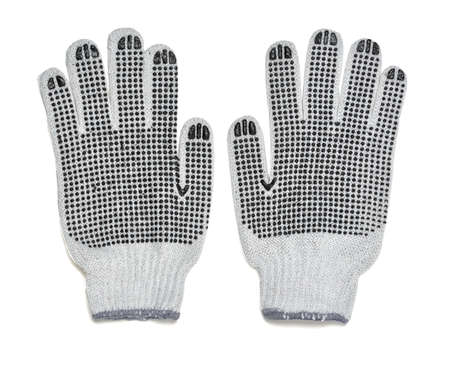 Pair of white knitted gloves with rubber-covered  side.  Protective gloves for working with hands. Cover and hand-protection. Gardening. Type of clothing.の写真素材