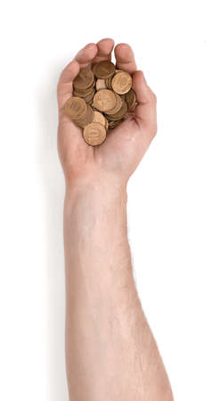 Close up view of a man's hand holding handful of ruble coins isolated on white background.の写真素材