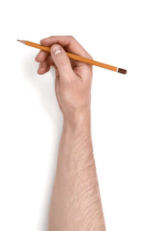 Close up view of a man's hand holding a pencil isolated on white background.の写真素材