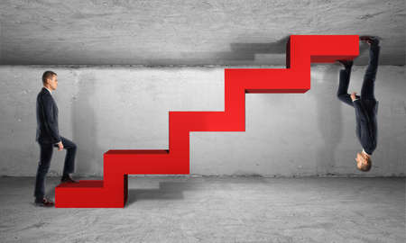 Two businessman climb one red ladder from different sides It's all relative. Highs and lows. Enterprise life cycle.の写真素材
