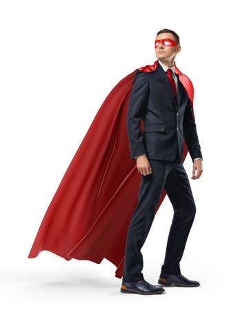 A businessman in a hero red cape and a mask in front view looking in the distance over his shoulder on white background.の写真素材
