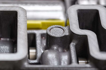 Mechanical part with metal components and hydraulic valves