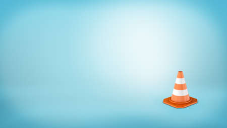 3d rendering of a striped traffic cone placed on blue background.の写真素材