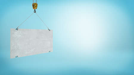 3d rendering of a blank grey concrete block caught on a construction crane hook on blue background.の写真素材