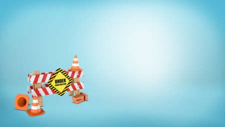 Three traffic cones, red bricks and a road barrier with an Under construction sign on blue background.の写真素材